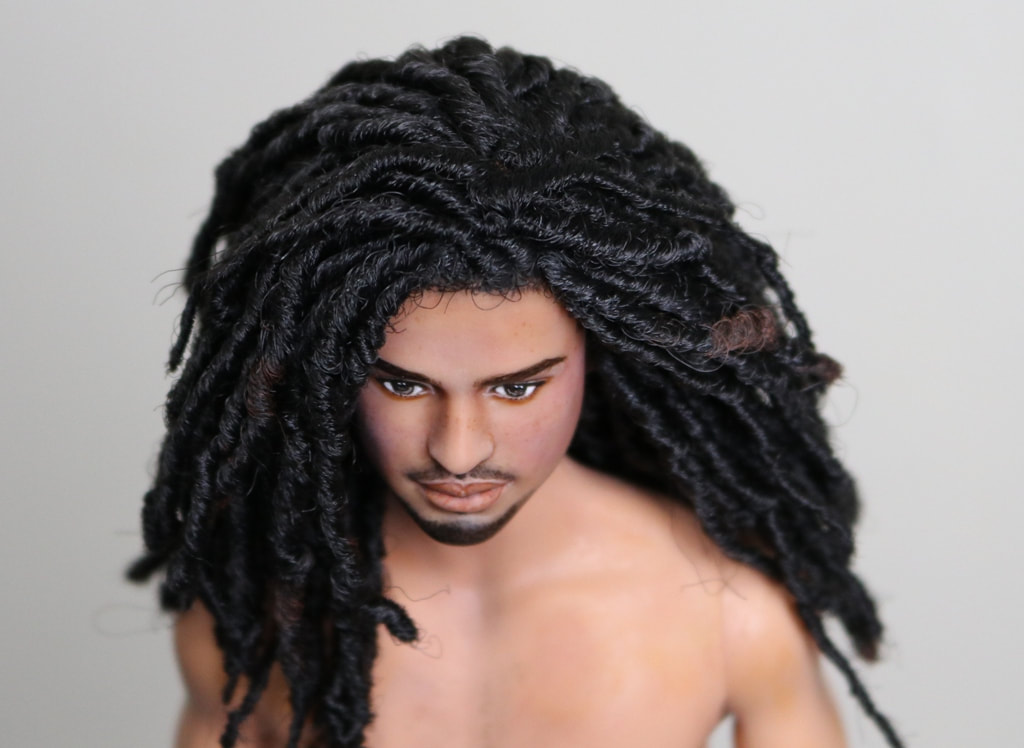 black ken doll with dreads